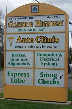 Garden Hwy Auto Clinic street sign